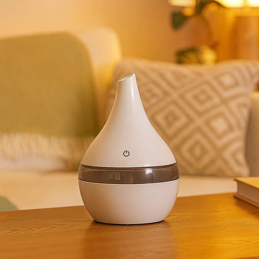 Idées cadeaux pour adulte – humidificateur et diffuseur d’huiles essentielles blanc, parfait pour créer une ambiance relax et purifier l’air intérieur. Koolkado.